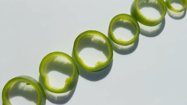 Abstract Green Bubbles on White Background with Shadows and Reflections.