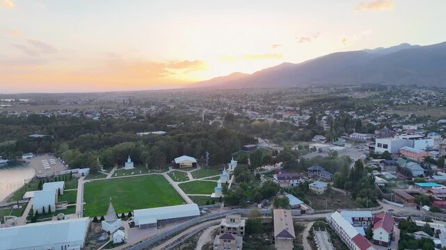 Cholpon Ata, Kyrgyzstan &ndash; December 2, 2025: Clear blue Issyk Kul Lake with mountain views near this popular tourist destination.