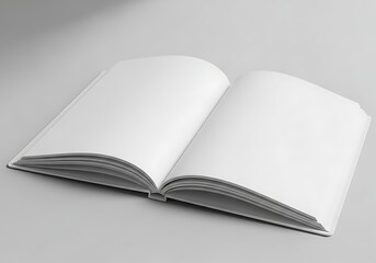 Fototapeta premium Open blank book on a gray surface, ideal for education or reading concepts