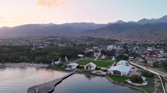 Cholpon Ata, Kyrgyzstan &ndash; December 2, 2025: Clear blue Issyk Kul Lake with mountain views near this popular tourist destination.