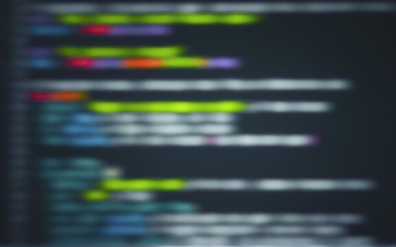 Blurred programming code on computer screen