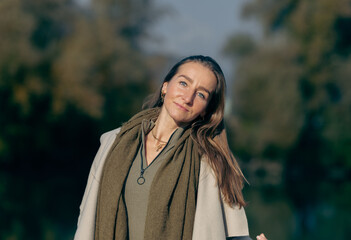Caucasian female adult enjoying outdoor nature in casual attire