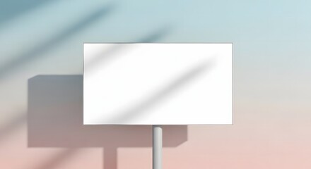 Fototapeta premium Blank white sign on a pole with soft shadows and a gradient background, perfect for copyspace