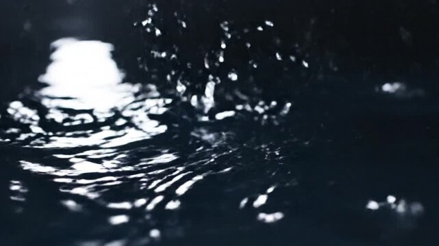 Water drop falling into dark blue liquid creating splashes and ripples with reflection. Ai generative