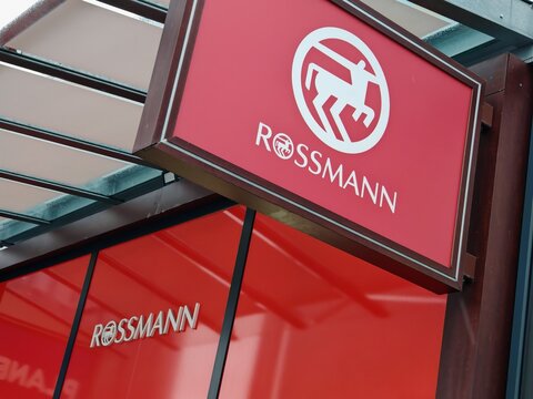 Prague,Czech Republic-May 6 2025: Rossmann drugstore retail branch exterior in urban shopping area offering cosmetics, hygiene products and household goods.