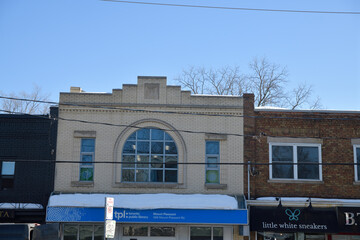 Fototapeta premium exterior building facade and sign of Toronto Public Library - Mount Pleasant Branch located at 599 Mt Pleasant Rd