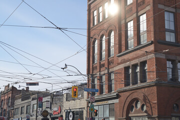 Fototapeta premium looking west (north side) on Queen St E intersection and site of The Broadview Hotel, located at 106 Broadview, Toronto
