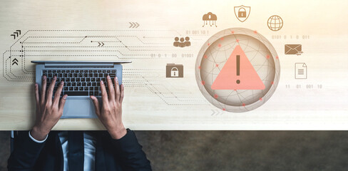 Red warning triangle representing a cybersecurity threat or data breach alert, surrounded by...