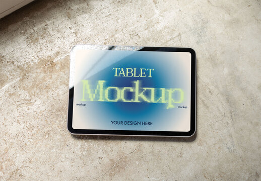 Real photo of Tablet on a Rough Surface. PSD mockup ready for your design.
