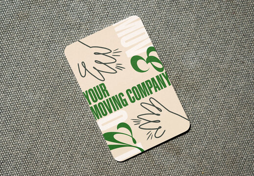 Real photo of Vertical rounded edges Business Card Mockup on Soft Surface