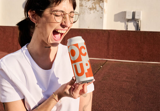 Real photo of Large Can Held by woman. PSD template mockup ready to use