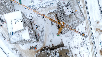 Tower crane on a construction site in winter