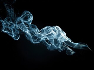 Fototapeta premium smoke wisps glow isolated on a black background