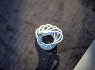 White usb cable on the table