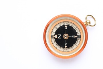 One compass on white background, top view. Space for text