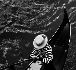 silhouette of a gondolier hat on the gondola  © Agata Kadar