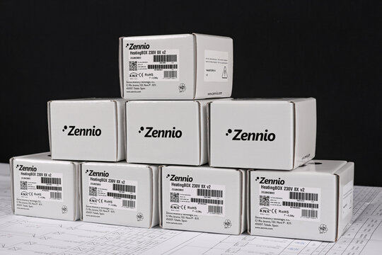 Zennio equipment in cardboard packaging on an electronic digram during the assembly of the electrical control panel.