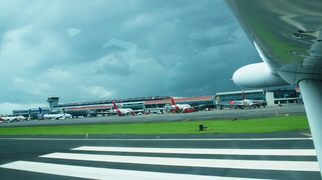 Airplanes  landing at international airport Bocas del Toro  -  at aiport San Jose Kostarica