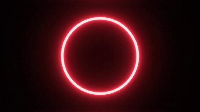 Crimson glowing circle floating in darkness with soft secondary rings