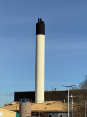 Environment polluting industrial chimney stack from industrial units.
