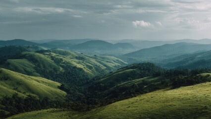 Obraz premium Rolling Green Hills and Distant Mountains
