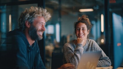 Fototapeta premium Smiling colleagues working together