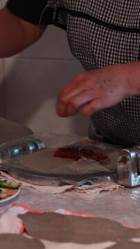 Preparing mexican food, Woman's hands preparing a traditional Mexican molote with tinga filling
