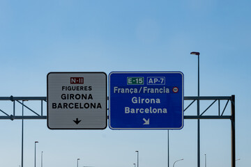 Obraz premium Driving on high-speed highways in southwestern France, road signs A9 motorways, border of Spain, connecting cities and regions, heavy traffic jam in summer