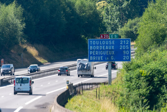 Highway car journey on A20-E9 route through central and southern France, connecting major cities: Vierzon, Limoges, Brive, Cahors, Montauban, Toulouse, diverse road signs