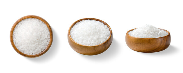 Three piles of coarse sea salt crystals in a wooden bowls, shown from top and side views, isolated...