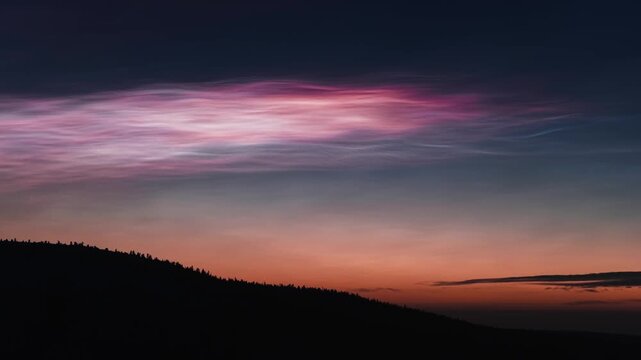 Rare Nacreous Clouds Over Arctic Mountain at Sunset in Lapland, Finland &ndash; Aerial 4K Video