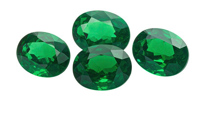 Four brilliant, oval-cut green gemstones clustered closely on a stark black background