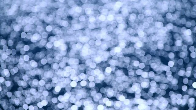 Soft sparkle moves slowly. Ocean glow creates calm. Blurry sea shines subtly. Glowing reflections drift. Soft focus water sparkles. Sea light feels endless. Bokeh glow floats freely. Ocean shimmer.