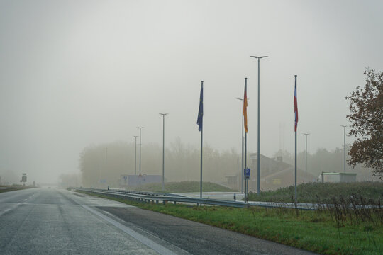 Flags in Fog at Denmark Germany Border Near Padborg