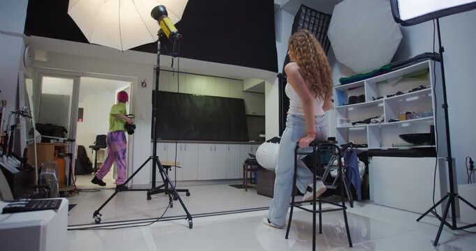 Female Photographer with Pink Hair and Female Model in Photoshoot: Creative Studio Photography