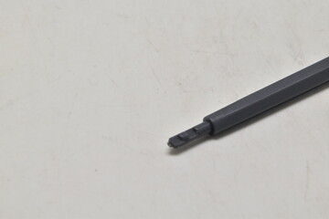 Close up of kitchen utensil handle detail isolated on light background, modern cooking tool accessory concept.