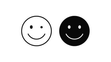 Two contrasting circular faces one white with a black smile the other black with a white smile