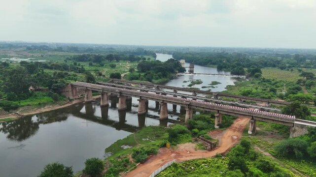 Railway Bridge Aerial View, Train Track Over River, Rail Infrastructure Landscape, River Crossing Rail Line, kharun nadi railway line stock video