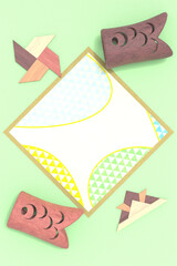 木製の鯉のぼりと折り紙風の置き物が並ぶ3DCG風景