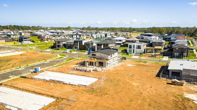 Drone View of Contemporary Family Homes in Expanding Urban Neighborhood
