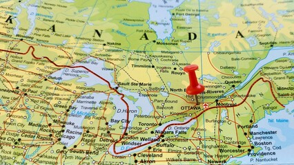 Fototapeta premium View of Ottawa, is the capital city of Canada. It is located in the southern portion of the province of Ontario, on a geographical map of America, marked with red push pin