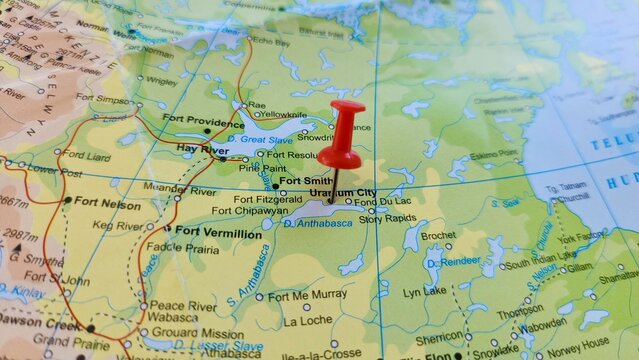 View of Uranium City, is a northern settlement in Saskatchewan, Canada, on a geographical map of America, marked with red pushpin