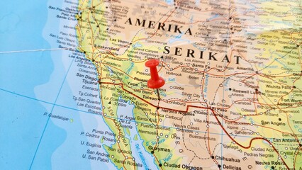 View of Tucson, is a city in Pima County, Arizona, United States, and its county seat, on a geographical map of America, marked with red pushpin