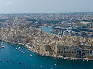 Aerial view of coastal city and harbor - Gozo, Malta