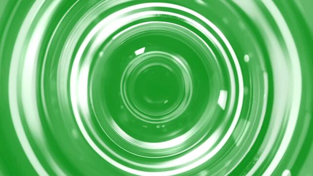 Expanding circular swirl waves motion graphics with green screen background