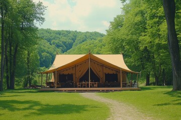 Obraz premium Spacious Glamping Tent in Lush Green Nature