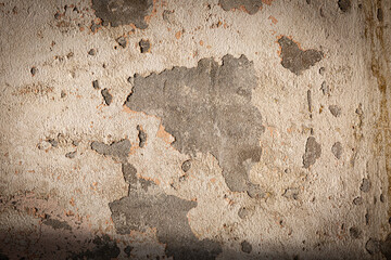 Old concrete texture background with peeling paint, showcasing weathered,