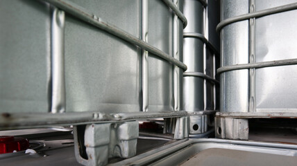 A 1,000-liter square chemical storage tank is placed in a warehouse of an industrial plant.