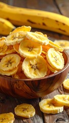 Close-up of sliced, dried fruit snacks in a wooden bowl