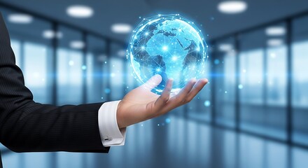 A person holds a glowing digital earth in the palm of their hand